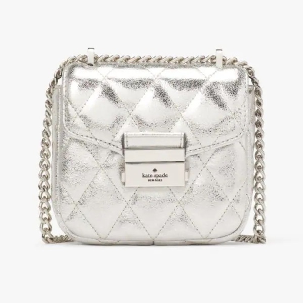 KATE SPADE CAREY METALLIC MICRO FLAP CROSSBODY
Color: Lunar Light